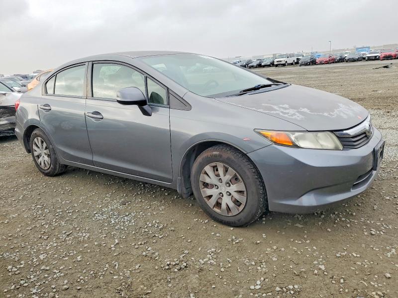 Photo 4 from auction – 2012 HONDA CIVIC LX with VIN JHMFB2F51CS005184