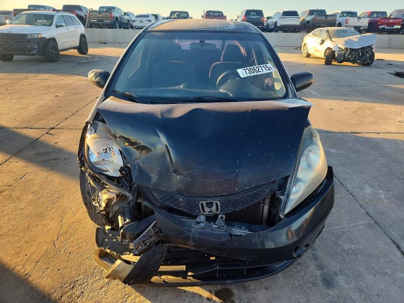 Photo 5 from auction – 2009 HONDA FIT with VIN JHMGE882X9S068052