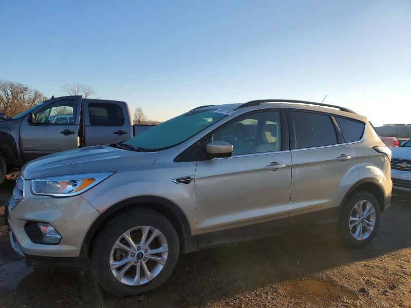 FORD ESCAPE SE 2018 with VIN 1FMCU9GD3JUD50968 - Photo from auction