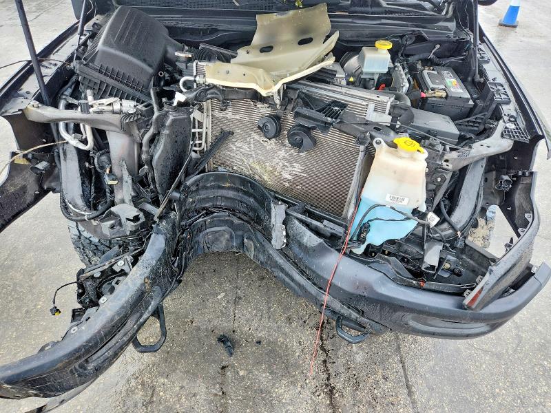 Photo 11 from auction – 2021 RAM 1500 with VIN 1C6SRFLT6MN621136