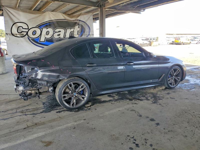 Photo 3 from auction – 2018 BMW M550XI with VIN WBAJB9C55JB049806