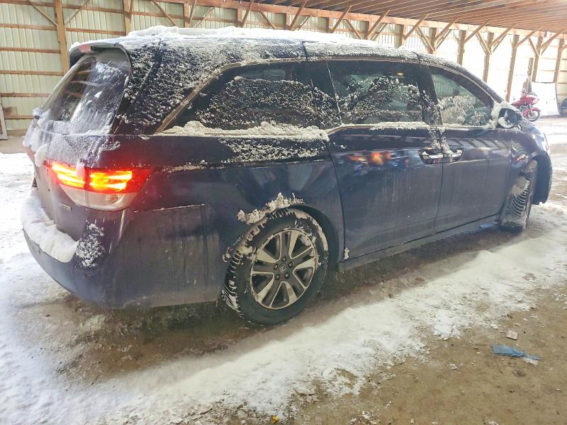 Photo 3 from auction – 2014 HONDA ODYSSEY TO with VIN 5FNRL5H99EB510211