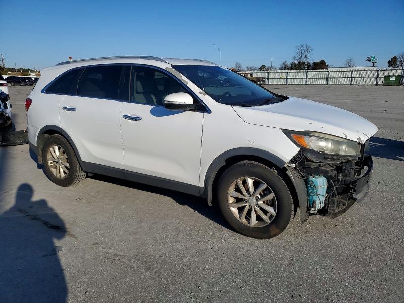 Photo 4 from auction – 2016 KIA SORENTO LX with VIN 5XYPG4A37GG014895