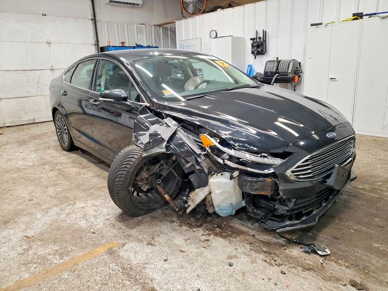 Photo 4 from auction – 2018 FORD FUSION TIT with VIN 3FA6P0D99JR205614