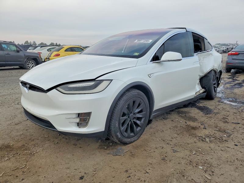 TESLA MODEL X 2016 with VIN 5YJXCAE20GF003031 - Photo from auction