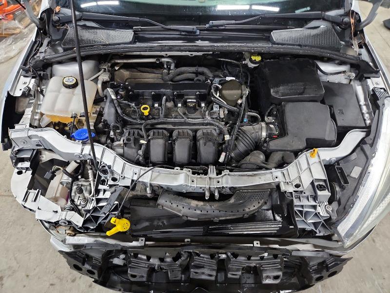 Photo 11 from auction – 2015 FORD FOCUS SE with VIN 1FADP3F21FL348412