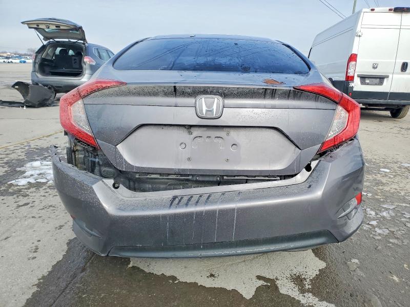 Photo 6 from auction – 2018 HONDA CIVIC LX with VIN 19XFC2E50JE037771