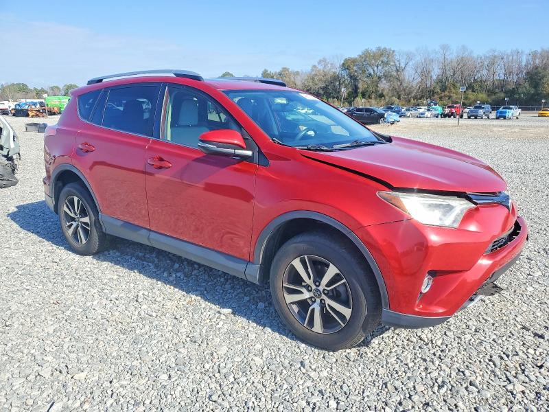 Photo 4 from auction – 2016 TOYOTA RAV4 XLE with VIN JTMWFREV1GJ091737