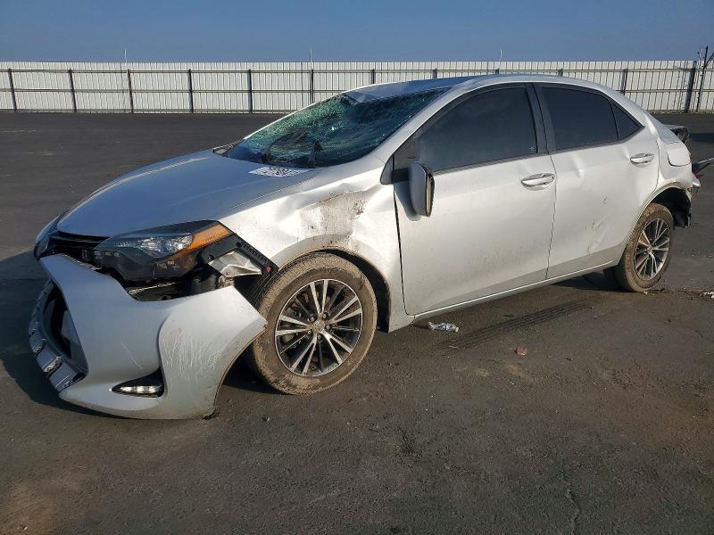 TOYOTA COROLLA 2017 with VIN 2T1BURHE9HC758602 - Photo from auction
