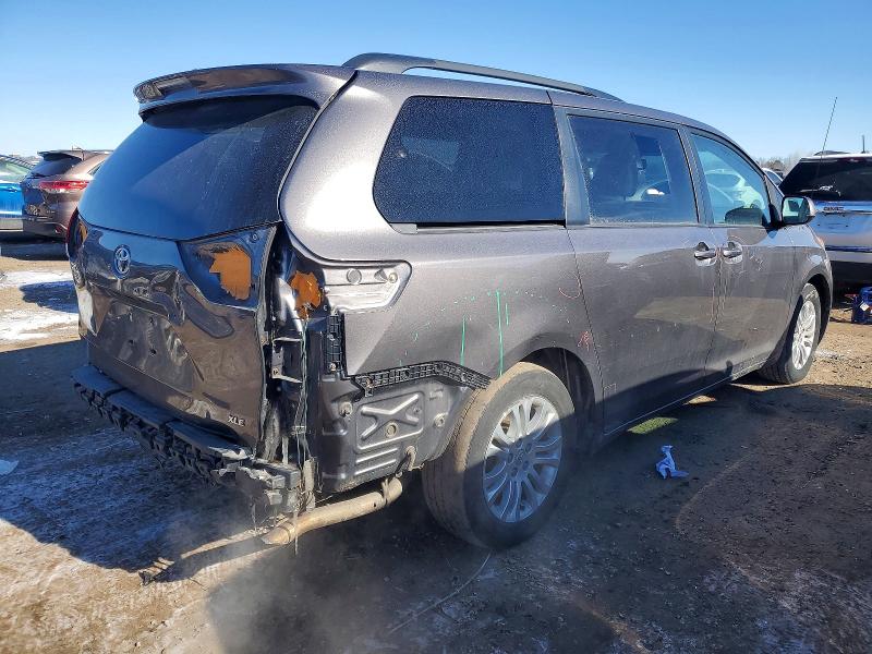 Photo 3 from auction – 2014 TOYOTA SIENNA XLE with VIN 5TDYK3DC1ES422737