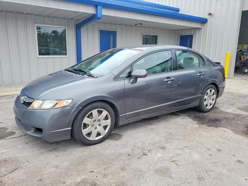 HONDA CIVIC LX 2011 with VIN 2HGFA1F59BH309823 - Photo from auction