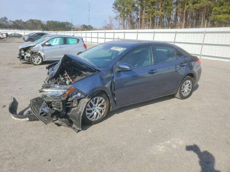 TOYOTA COROLLA 2018 with VIN 2T1BURHE3JC977948 - Photo from auction
