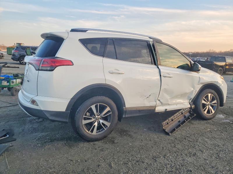 Photo 3 from auction – 2016 TOYOTA RAV4 with VIN JTMWFREV5GJ074195