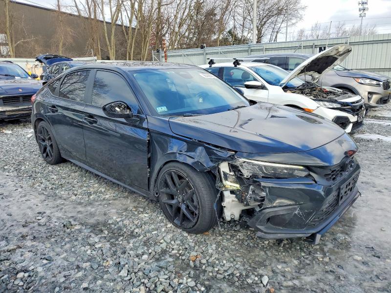 Photo 4 from auction – 2023 HONDA CIVIC SPOR with VIN 19XFL2H83PE018999