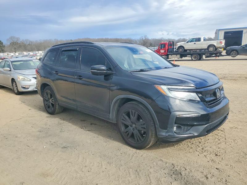 Photo 4 from auction – 2021 HONDA PILOT BLAC with VIN 5FNYF6H7XMB005574
