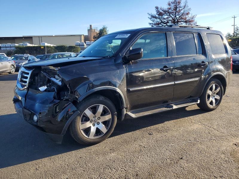 HONDA PILOT TOUR 2012 with VIN 5FNYF4H97CB023163 - Photo from auction