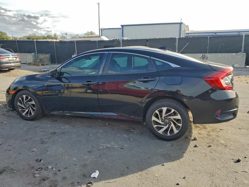Photo 2 from auction – 2017 HONDA CIVIC EX with VIN 19XFC2F74HE063641