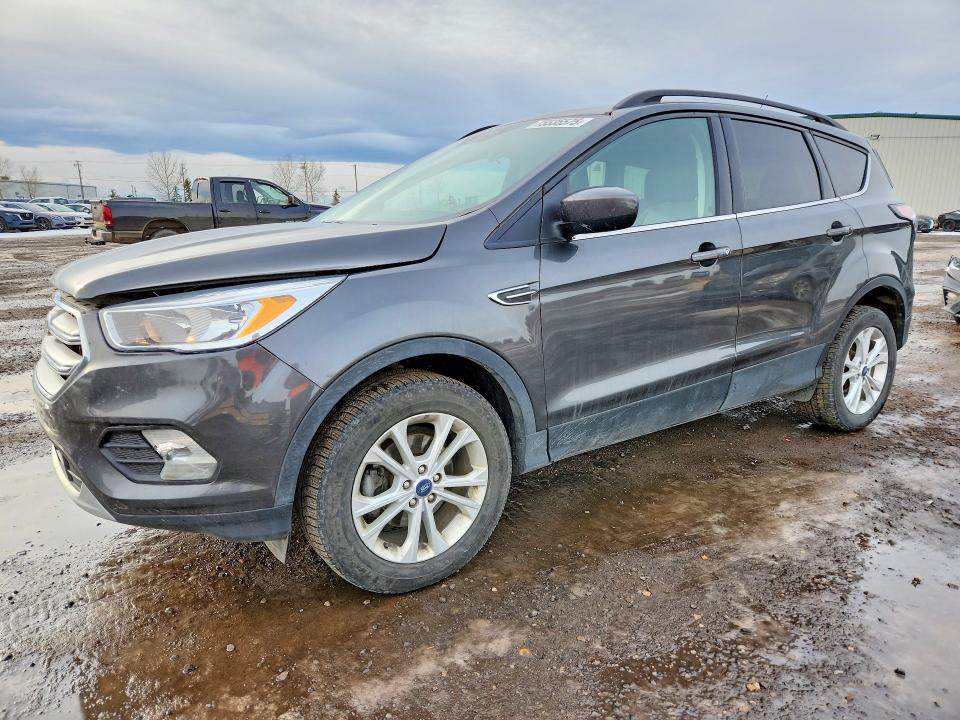 FORD ESCAPE 2018 with VIN 1FMCU0GD1JUC95562 - Photo from auction