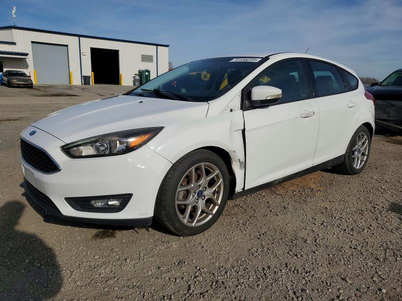 FORD FOCUS 2015 with VIN 1FADP3K24FL318472 - Photo from auction