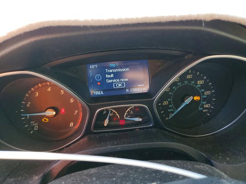 Photo 9 from auction – 2014 FORD FOCUS with VIN 1FADP3F21EL238555