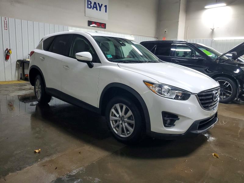 Photo 4 from auction – 2016 MAZDA CX-5 with VIN JM3KE2CY1G0748278