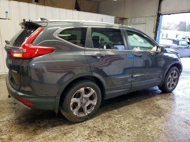 Photo 3 from auction – 2018 HONDA CR-V with VIN 7FARW2H82JE013044