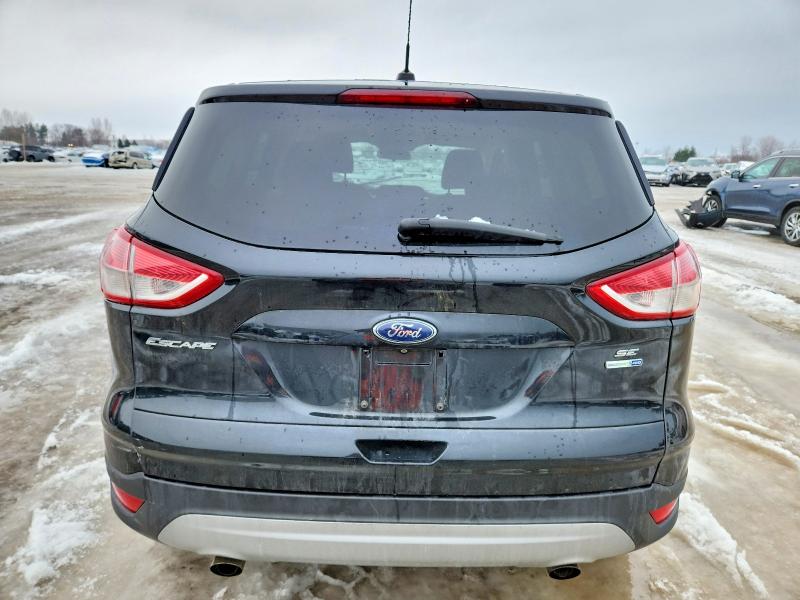 Photo 6 from auction – 2015 FORD ESCAPE SE with VIN 1FMCU9G99FUC47251
