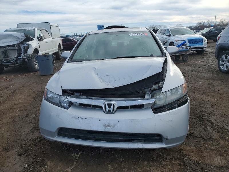 Photo 5 from auction – 2006 HONDA CIVIC with VIN JHMFA16846S003991
