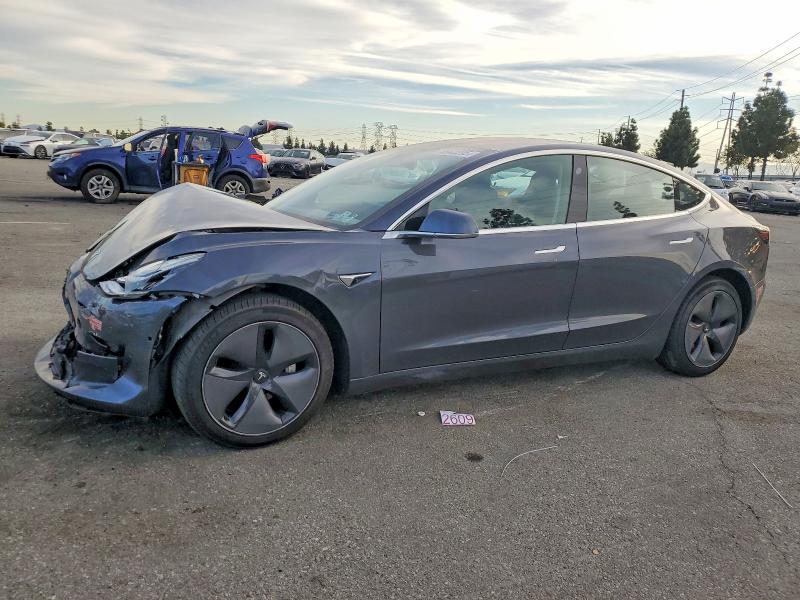 TESLA MODEL 3 2018 with VIN 5YJ3E1EB8JF089916 - Photo from auction