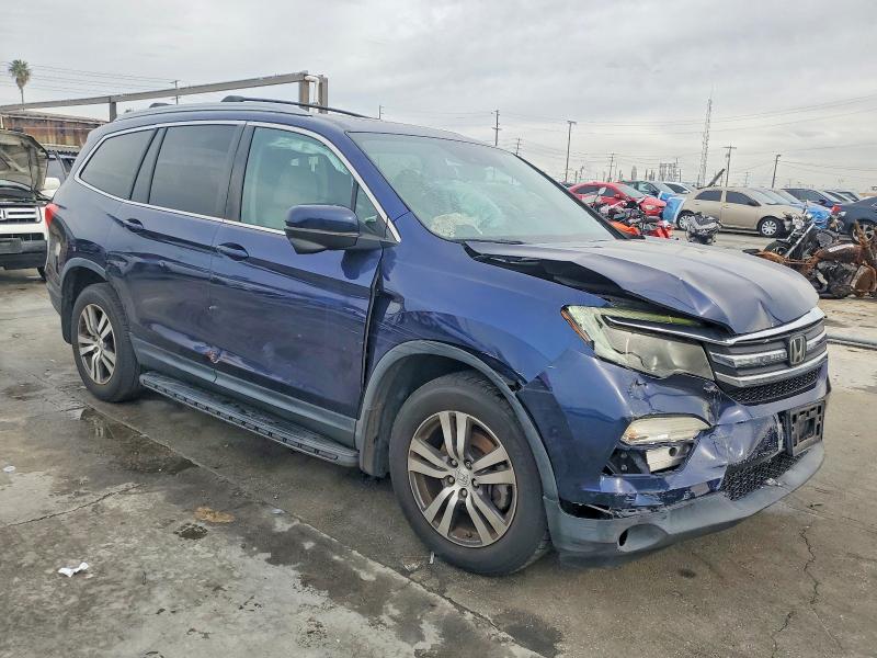 Photo 4 from auction – 2016 HONDA PILOT with VIN 5FNYF5H63GB008399