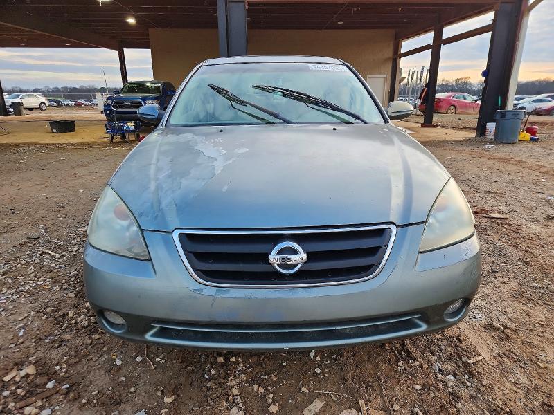 Photo 5 from auction – 2002 NISSAN ALTIMA with VIN 1N4AL11D42C703143