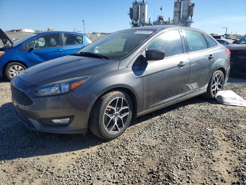 FORD FOCUS SE 2018 with VIN 1FADP3FE0JL224232 - Photo from auction