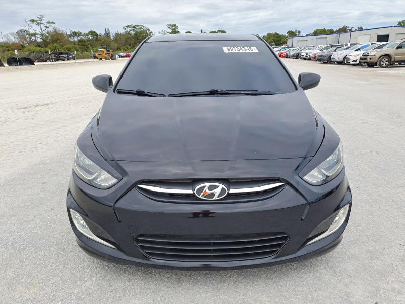 Photo 5 from auction – 2015 HYUNDAI ACCENT GLS with VIN KMHCT4AE7FU853630