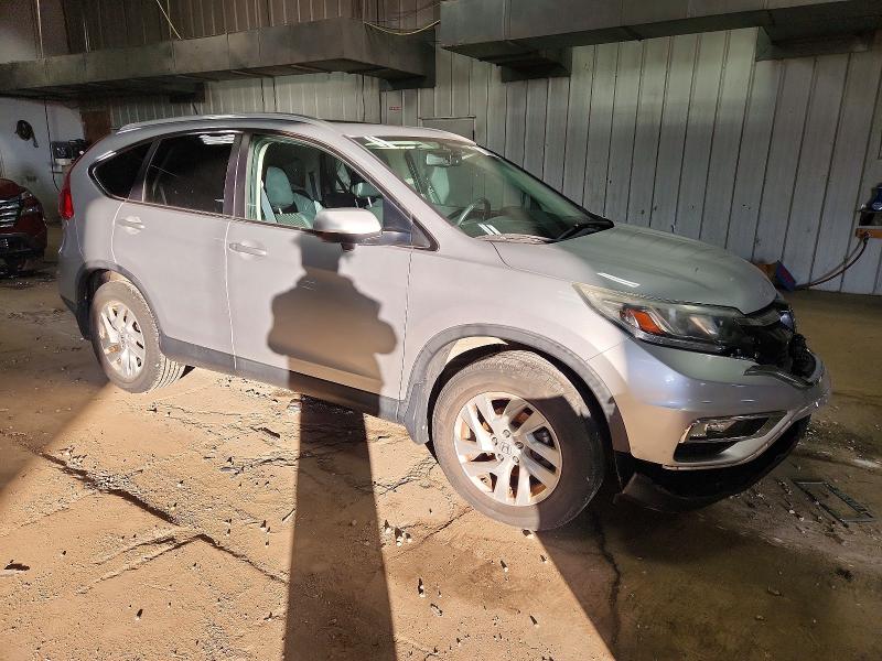 Photo 4 from auction – 2015 HONDA CR-V EXL with VIN 5J6RM4H76FL110220