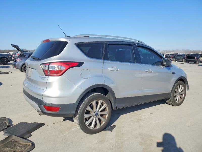 Photo 3 from auction – 2017 FORD ESCAPE TIT with VIN 1FMCU0JD8HUC18447