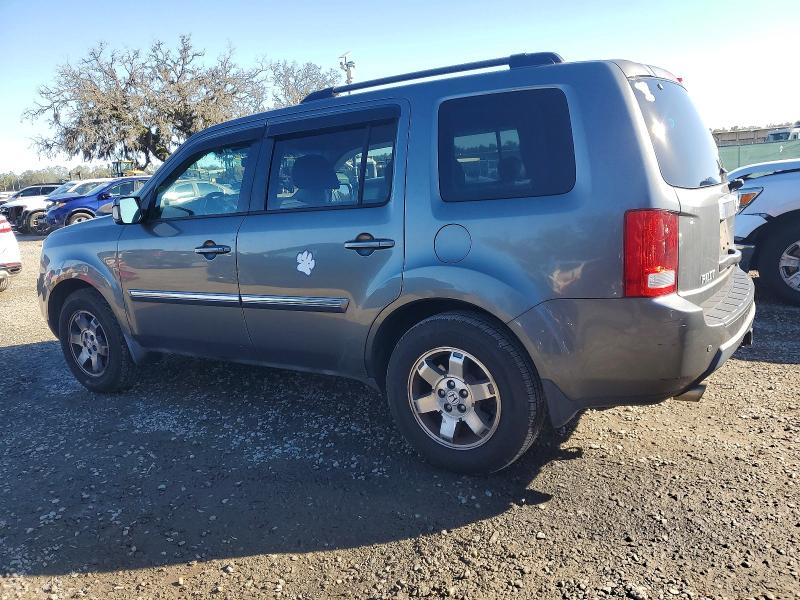 Photo 2 from auction – 2011 HONDA PILOT TOUR with VIN 5FNYF4H91BB016014