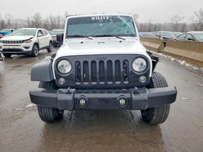 Photo 5 from auction – 2016 JEEP WRANGLER U with VIN 1C4BJWDG9GL263774