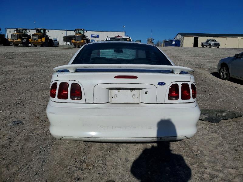 Photo 6 from auction – 1997 FORD MUSTANG with VIN 1FALP4040VF166855