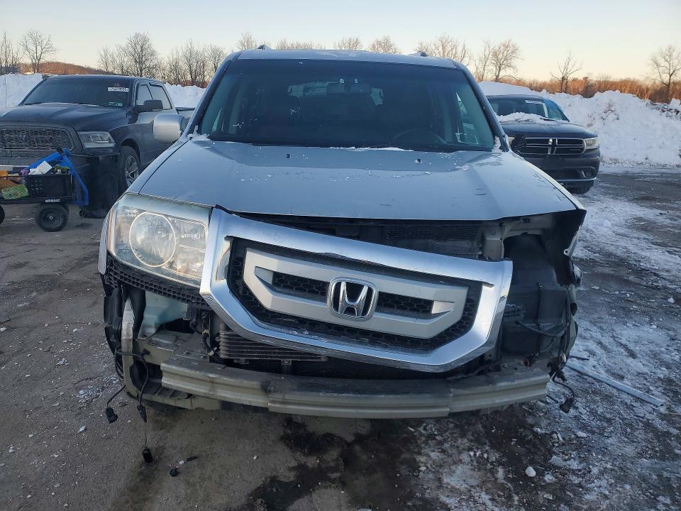 Photo 5 from auction – 2010 HONDA PILOT TOUR with VIN 5FNYF4H93AB027983