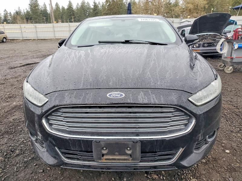 Photo 5 from auction – 2016 FORD FUSION TIT with VIN 3FA6P0K96GR319212