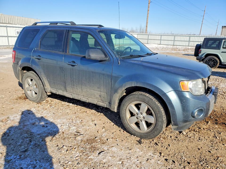 Photo 4 from auction – 2011 FORD ESCAPE LIM with VIN 1FMCU9E75BKB13957
