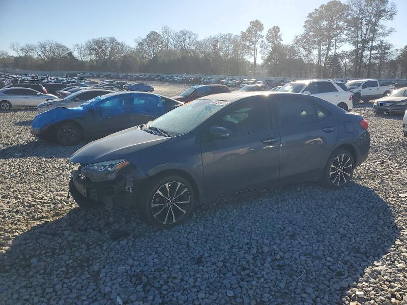 TOYOTA COROLLA 2018 with VIN 5YFBURHE0JP759921 - Photo from auction