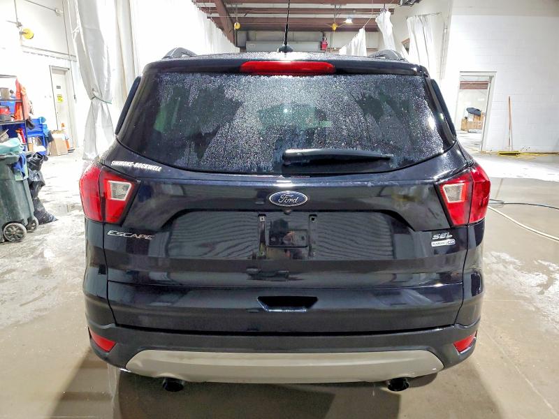 Photo 6 from auction – 2019 FORD ESCAPE with VIN 1FMCU9HDXKUB19257