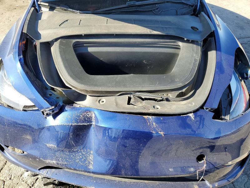 Photo 12 from auction – 2023 TESLA MODEL Y with VIN 7SAYGDEE8PF939227