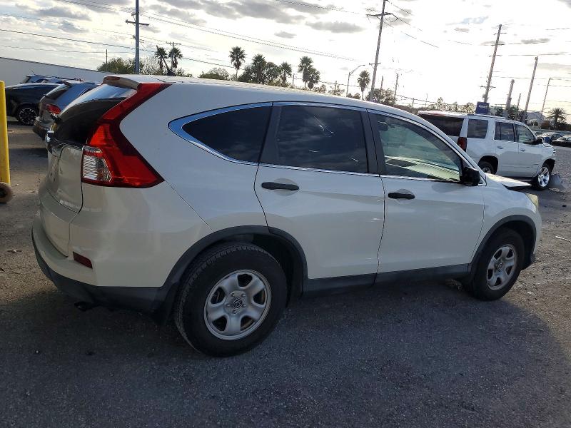 Photo 3 from auction – 2015 HONDA CR-V LX with VIN 5J6RM3H31FL027169