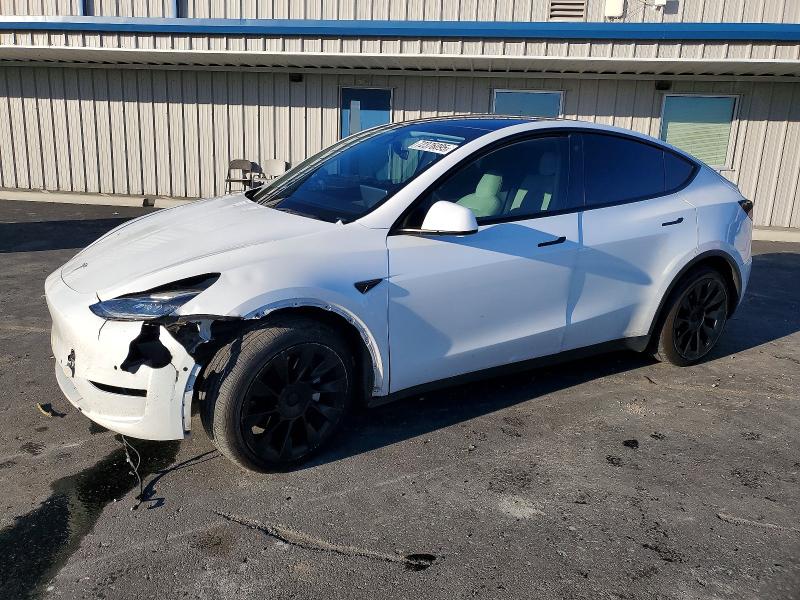 TESLA MODEL Y 2022 with VIN 7SAYGDEE3NF346582 - Photo from auction