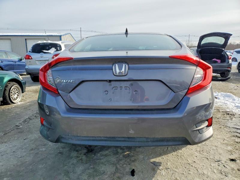 Photo 6 from auction – 2017 HONDA CIVIC EX with VIN 19XFC2F72HE219711
