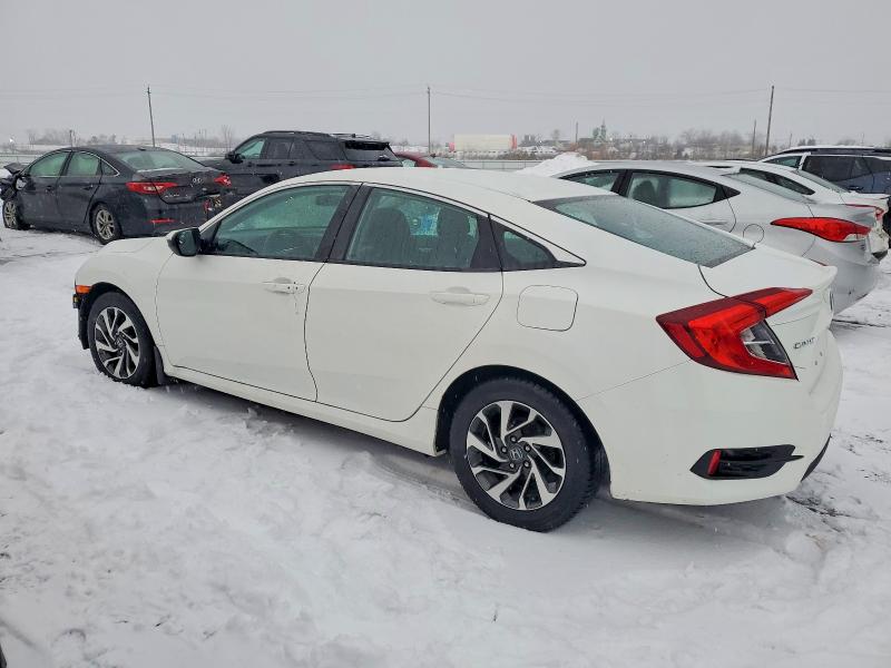Photo 2 from auction – 2018 HONDA CIVIC LX with VIN 2HGFC2F67JH027400