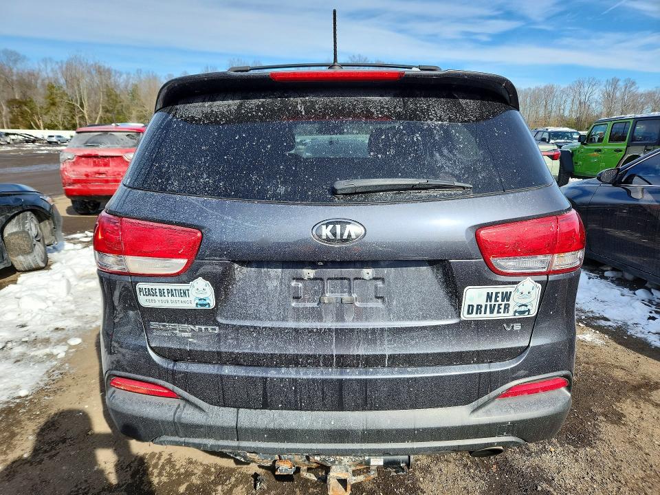 Photo 6 from auction – 2016 KIA SORENTO LX with VIN 5XYPG4A55GG110199