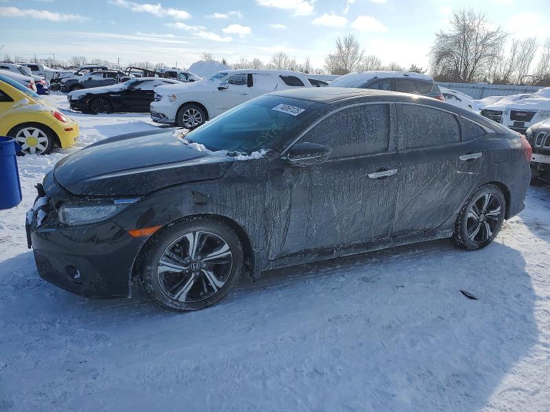 HONDA CIVIC 2017 with VIN 2HGFC1F96HH104157 - Photo from auction